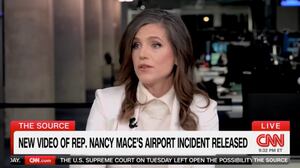 Nancy Mace wearing a white suit speaking to CNN's Kaitlan Collins.