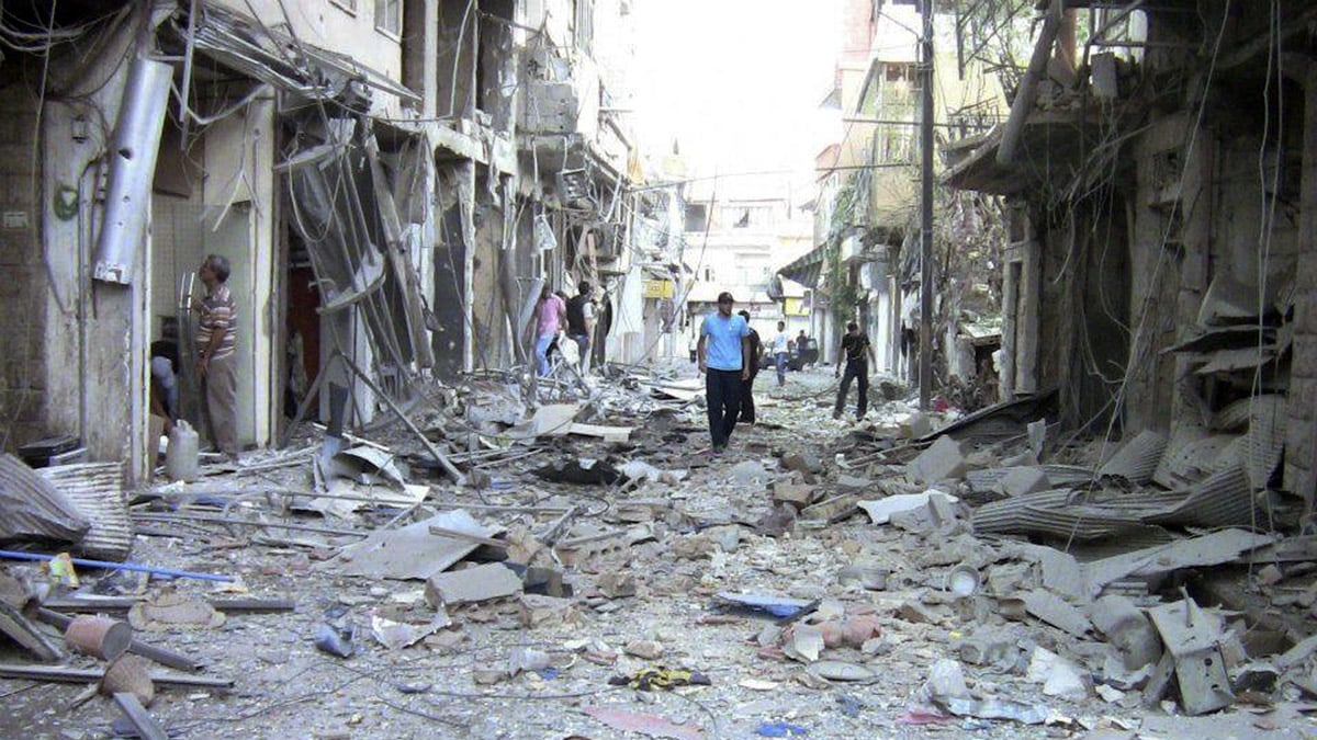 cheats/2012/08/23/syrian-forces-shell-damascus/syria-shelled-houses-damascus-cheat_pmpnoi