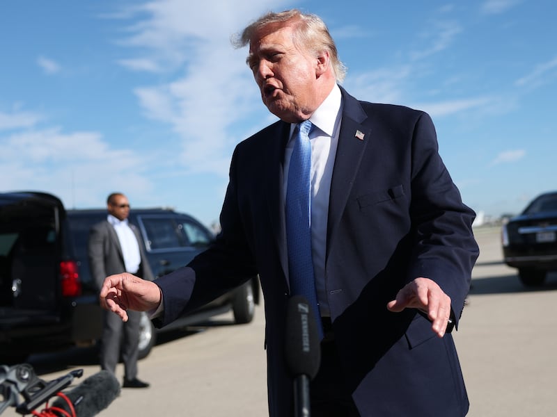 President Donald Trump speaks to reporters at O'Hare International Airport in Chicago, Illinois, on September 27, 2026.