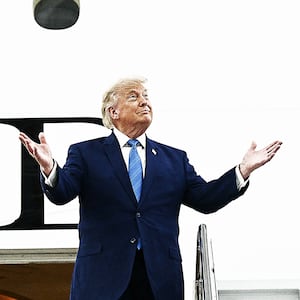 US President Donald Trump steps out of the new Air Force One,