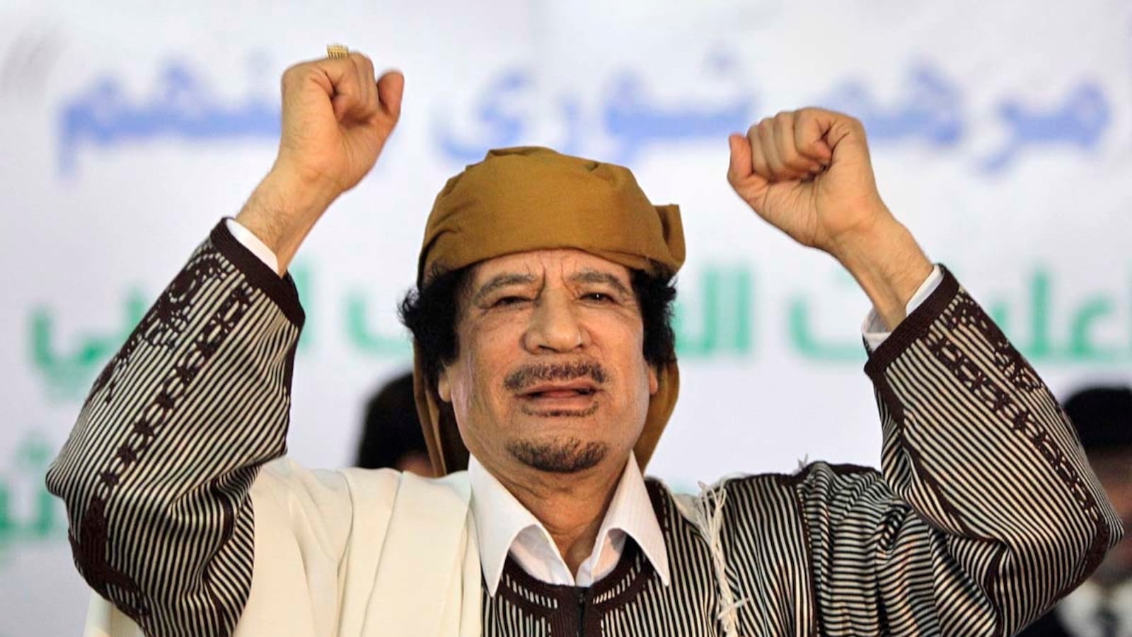 articles/2011/08/21/muammar-gaddafi-s-exile-options-after-fall-of-tripoli/gaddafi-flee-griswold_adcct4
