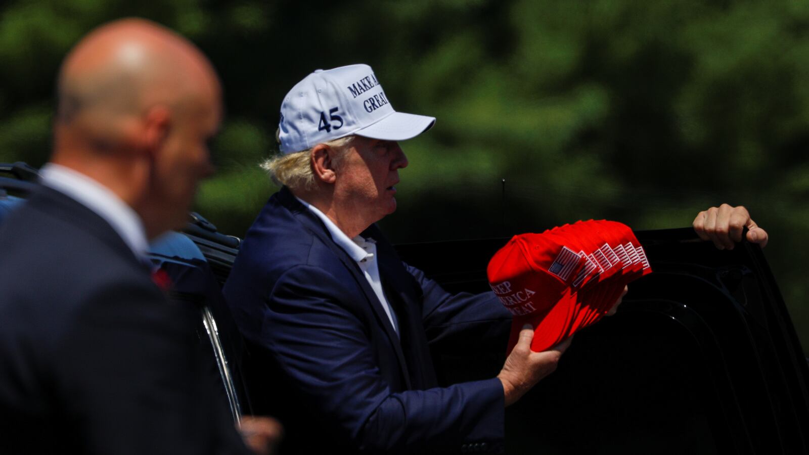 2020-07-26T183932Z_1176508885_RC261I9HAD9R_RTRMADP_3_USA-TRUMP_gf0zby