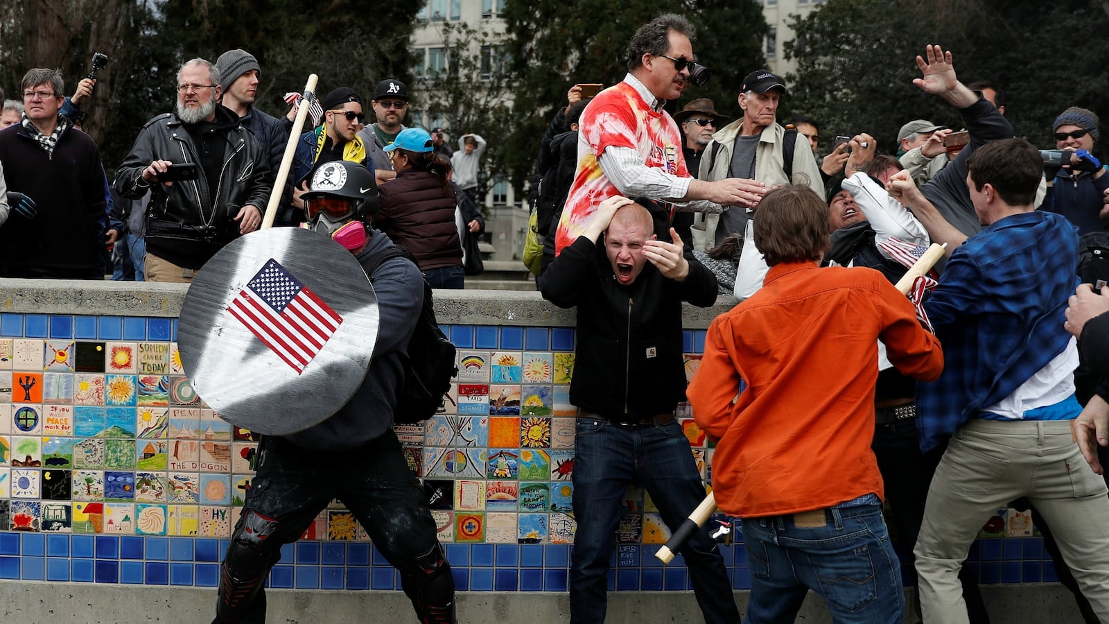 cheats/2017/03/05/violent-clashes-at-pro-trump-rallies/170305-protest-clashes-cheat_blpsjo