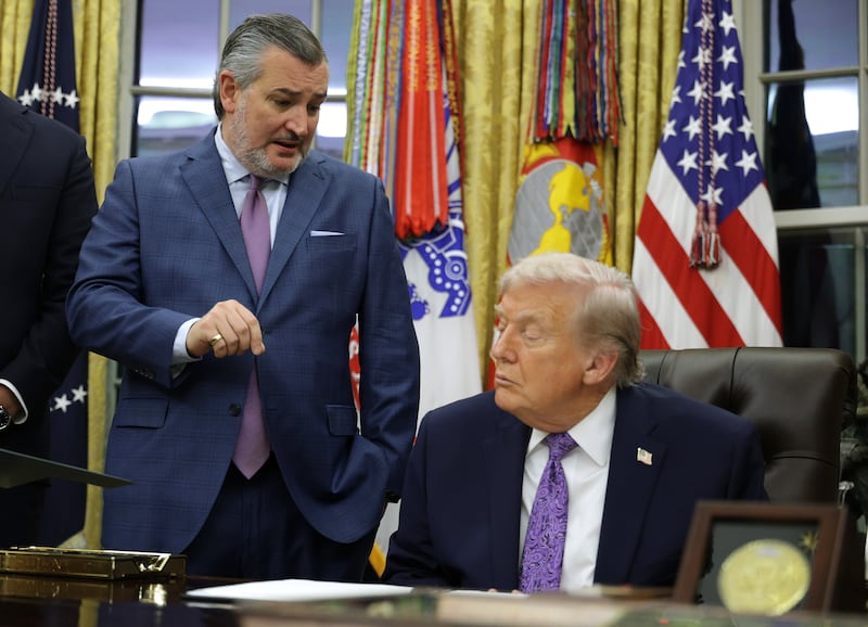 WASHINGTON, DC - DECEMBER 11: (L-R) U.S. Sen. Ted Cruz (R-TX) and President Donald Trump talk in the Oval Office of the White House on December 11, 2025 in Washington, DC. Trump signed an executive order that curbs states' ability to regulate artificial intelligence, something for which the tech industry has been lobbying. (Photo by Alex Wong/Getty Images)