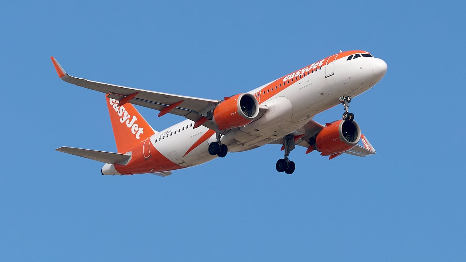 A 9H-VCO VistaJet Malta Bombardier G-A UZLB easyJet Airbus A320neo flies over the match venue during the UEFA European Under-19 Championship qualifying round group 13 soccer match between Czechia and Malta at the Centenary Stadium in Ta Qali, Malta, on November 15, 2025. (Photo by Domenic Aquilina/NurPhoto via Getty Images)