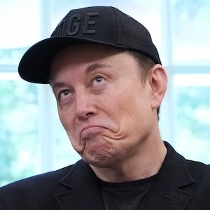 Tesla CEO Elon Musk speaks alongside U.S. President Donald Trump to reporters in the Oval Office of the White House on May 30, 2025 in Washington, DC. Musk, who served as an adviser to Trump and led the Department of Government Efficiency, announced he would leave his role in the Trump administration to refocus on his businesses.