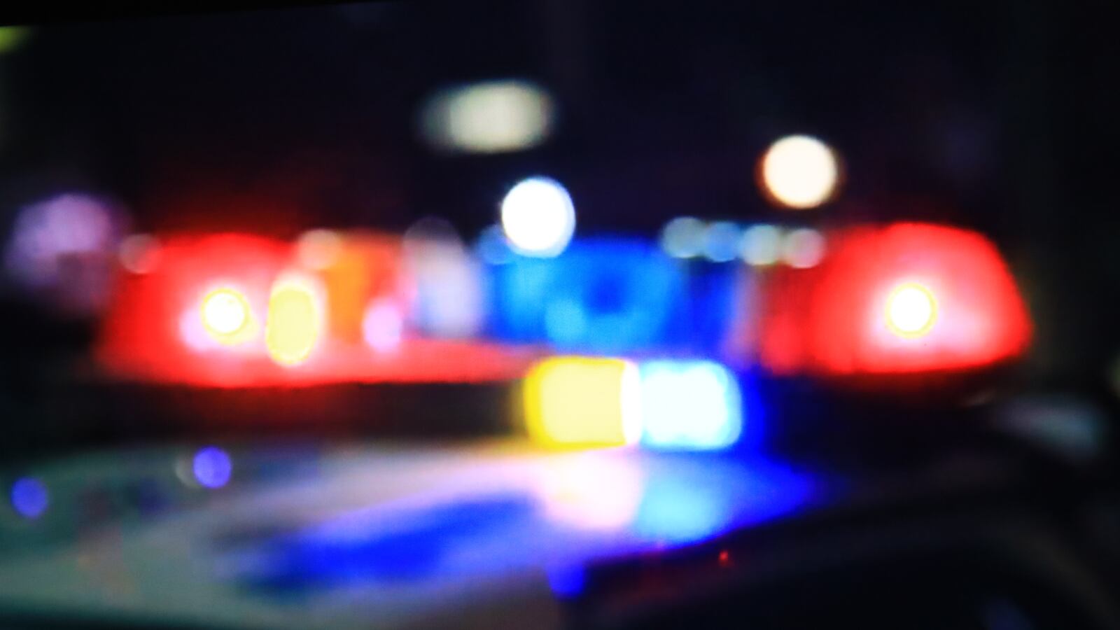 A police car with flashing lights.