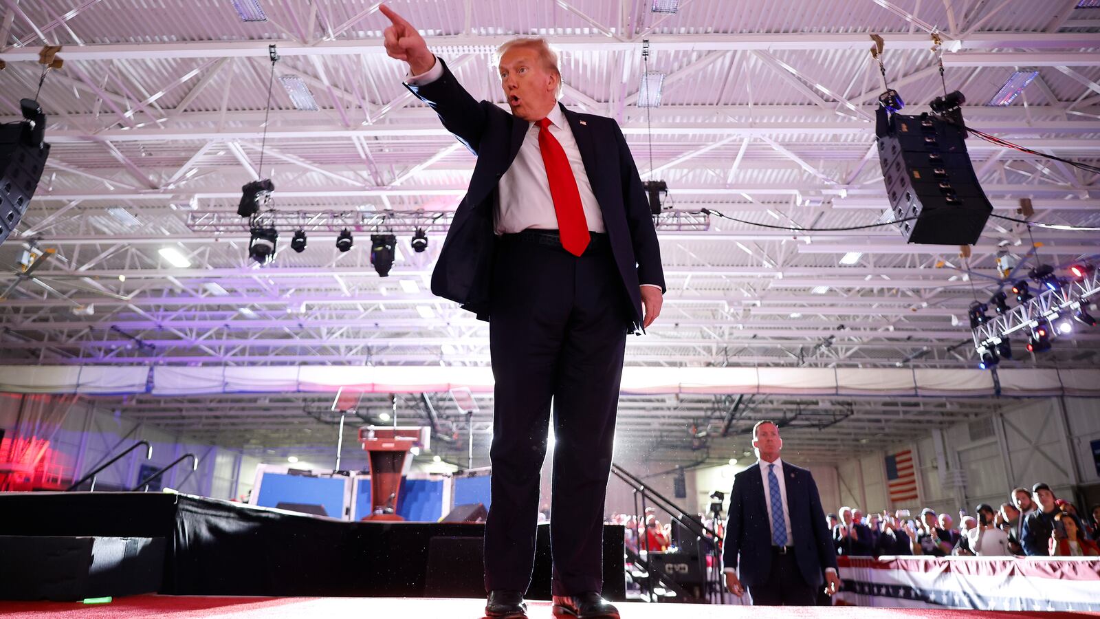 Republican presidential nominee, former President Donald Trump acknowledges his supporters at the end of a campaign rally at Macomb Community College on November 01, 2024 in Warren, Michigan. With four days until the election, Trump is campaigning for re-election on Friday in the battleground states of Michigan and Wisconsin.