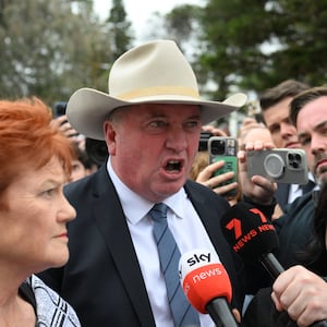 SYDNEY, AUSTRALIA - DECEMBER 16: Pauline Hanson leader of One Nation with member for New England, Barnaby Joyce as they lay flowers at the memorial next to Bondi Pavilion at Bondi Beach on December 16, 2025 in Sydney, Australia. Police say at least 15 people and one suspected gunman were killed and more than a dozen others injured when two attackers opened fire near a Hanukkah celebration at the world-famous Bondi Beach, in what authorities have declared a terrorist incident. (Photo by James D. Morgan/Getty Images)
