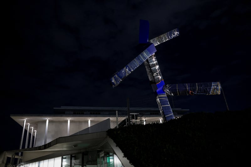 The sculpture titled "Blue" by artist Joel Shapiro sits wrapped in preparation for its removal from the grounds of the Kennedy Center for the Performing Arts, after being targeted for removal by the Trump administration, in Washington, D.C. on September 2, 2026.