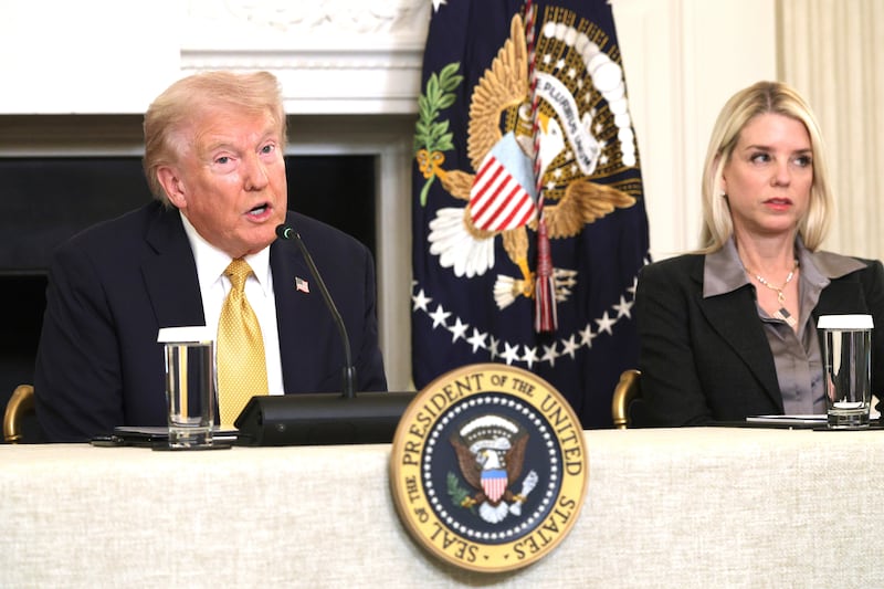 President Donald Trump, joined by Attorney General Pam Bondi