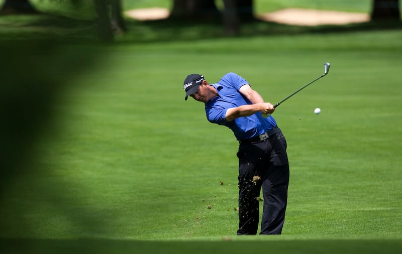 Canadian golfer Matt McQuillan hits a shot on the 17th hole during the Canadian Open Golf Tournament at Shaughnessy Golf and Country Club in Vancouver, British Columbia July 21, 2011.