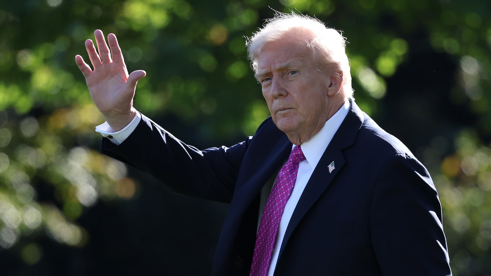 President Donald Trump walks across the South Lawn of the White House as he prepares to board Marine One on October 17, 2025 in Washington, DC.