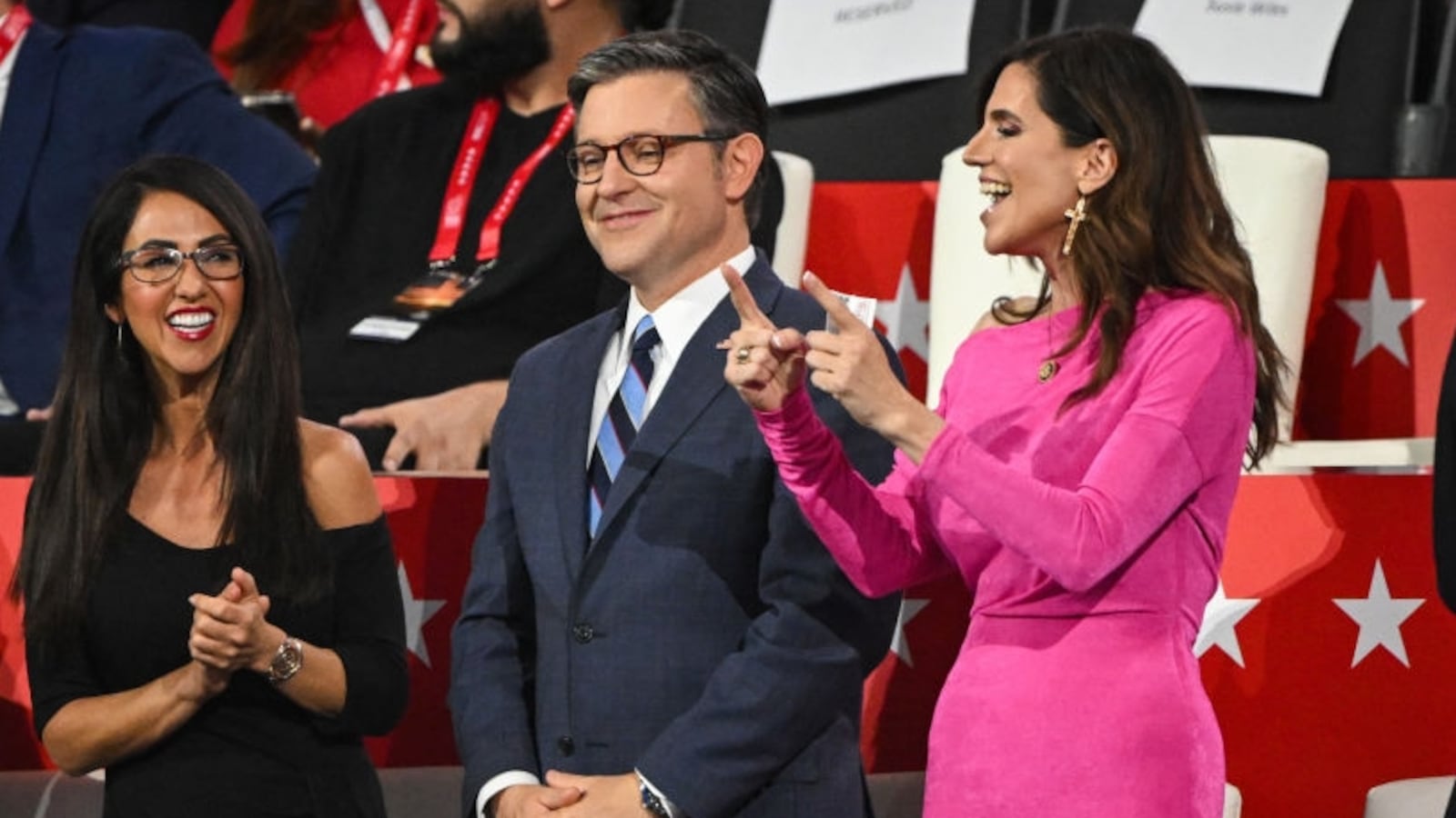 Speaker of the House Mike Johnson and U.S. Rep. Nancy Mace share a laugh on the third day of the Republican National Convention last July.