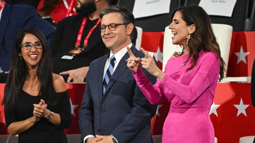 Speaker of the House Mike Johnson and U.S. Rep. Nancy Mace share a laugh on the third day of the Republican National Convention last July.