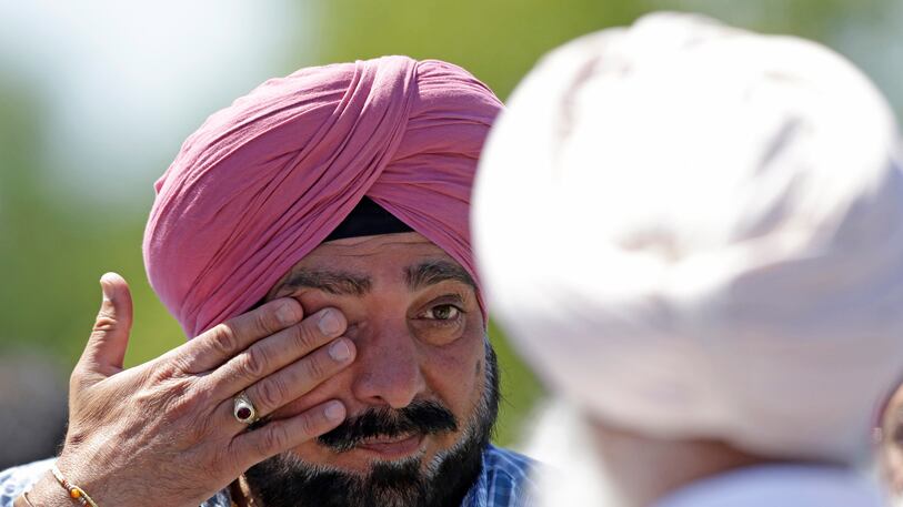 articles/2012/08/05/wisconsin-shooting-7-dead-at-sikh-temple/sikh-temple-shooting1_mvhlt4