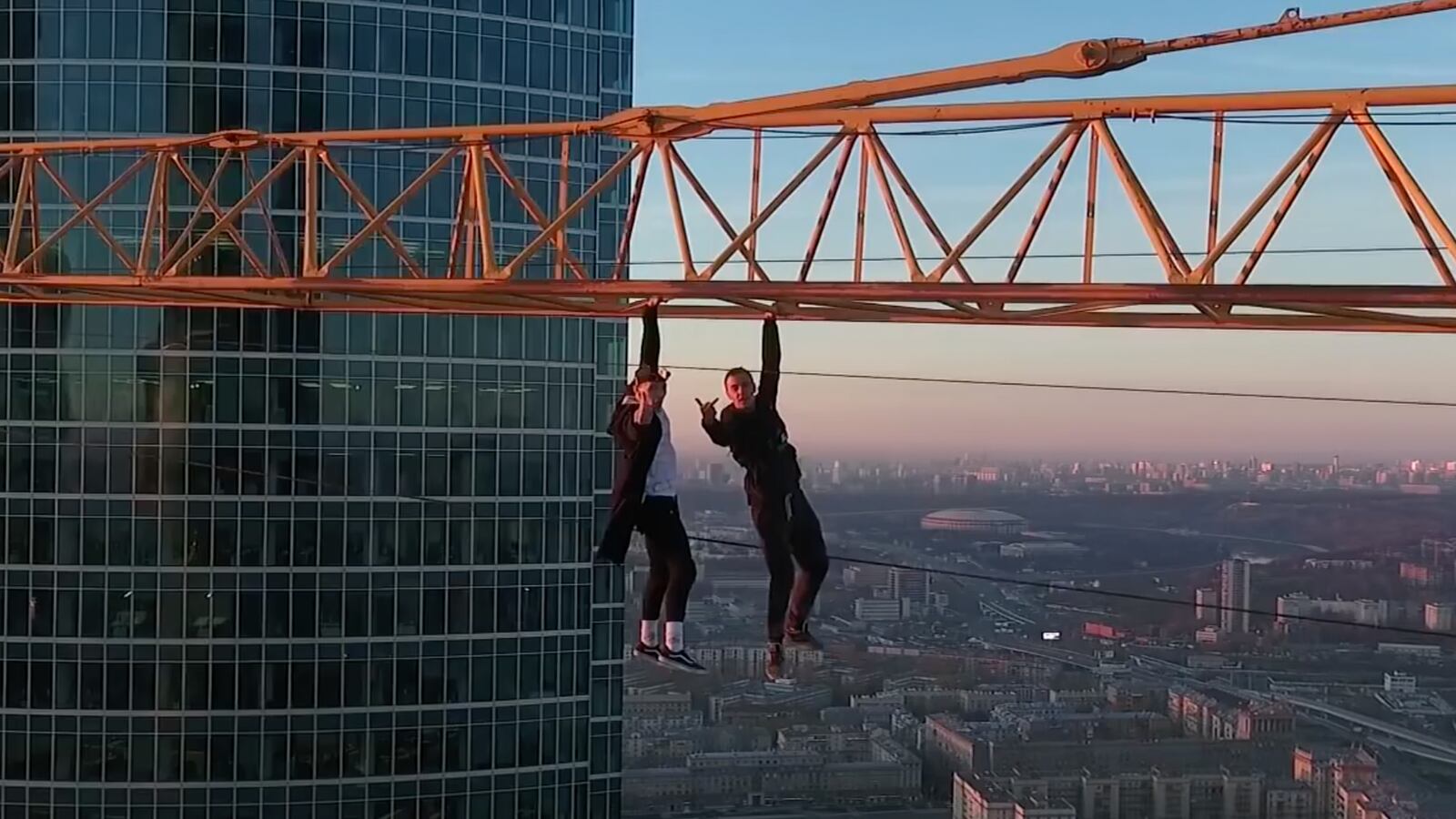 videos/2016/04/26/watch-two-idiots-hang-from-a-crane/160416-joiner-russianidiots_at480j