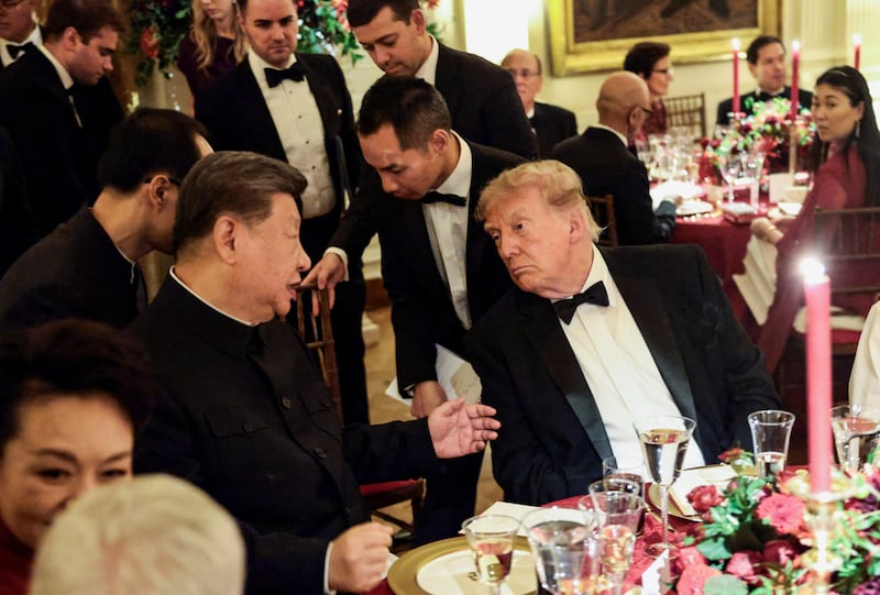 Chinese President Xi Jinping and US President Donald Trump speak during a state dinner at the White House in Washington, D.C., US, September 24, 2026. REUTERS/Evelyn Hockstein     TPX IMAGES OF THE DAY