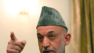 cheats/2009/10/23/karzai-defends-election-runoff/karzai-3_e7v6gs