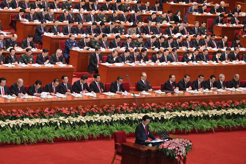 articles/2012/11/13/who-will-become-china-s-new-men-in-black/chinas-ruling-body-levin_ihn0jq