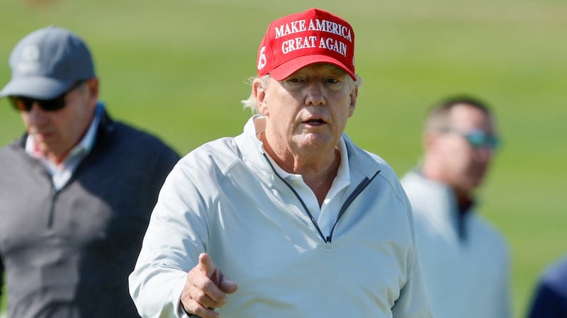 Donald Trump at one of his favorite places, a golf course.