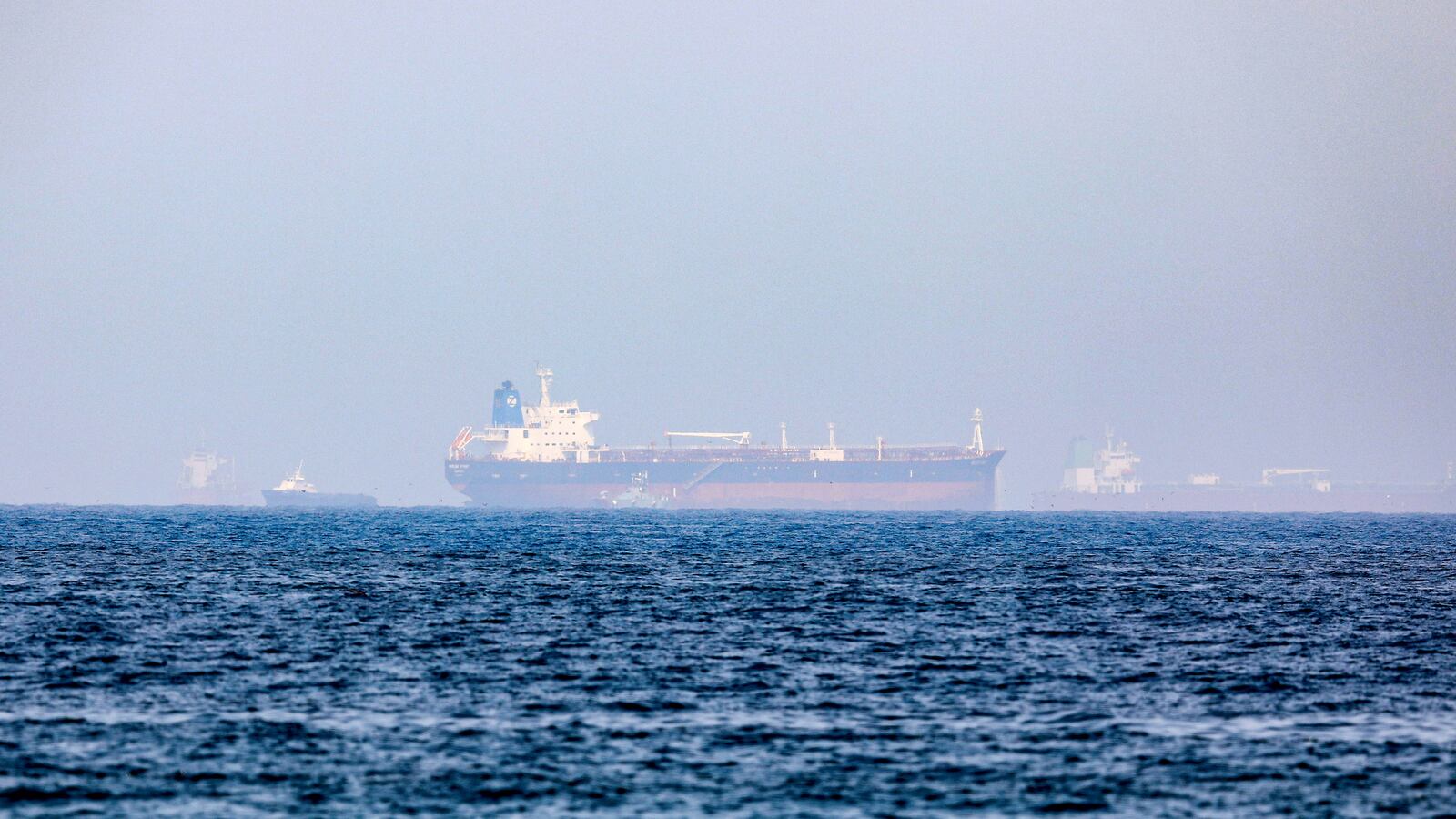 2021-08-03T131434Z_196239612_RC2LXO98M1SU_RTRMADP_3_SHIPPING-SECURITY-GULF-OMAN-IRAN_qy58cx
