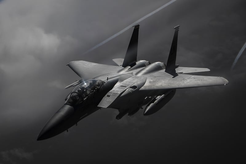 A U.S. Air Force F-15E Strike Eagle flies over Iraq on May 5, 2018. The F-15E Strike Eagle is a dual-role fighter designed to perform air-to-air and air-to-ground missions. An array of avionics and electronics systems gives the F-15E the capability to fight at low altitude, day or night, and in all weather.