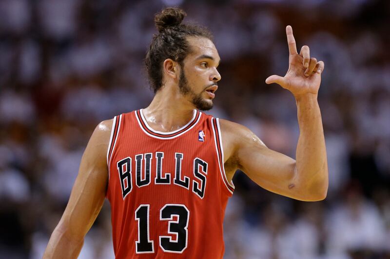 articles/2013/05/15/joakim-noah-has-the-manliest-bun-ever/130515-kumar-noah-tease-embed_ng4qrc