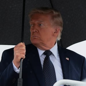 U.S. President Donald Trump looks on as he boards Air Force One at Joint Base Andrews, Maryland, U.S., on May 22, 2026.