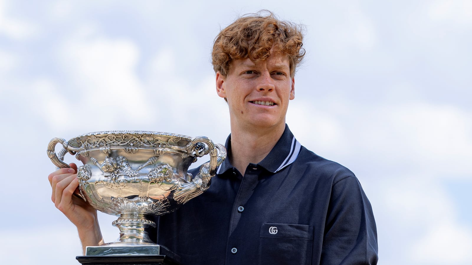 Jannik Sinner of Italy poses with the trophy during the Australian Open winner photo shoot at the Albert Park Lake, in Melbourne, Australia, Jan. 27, 2025. (Photo by Chu Chen/Xinhua via Getty Images)