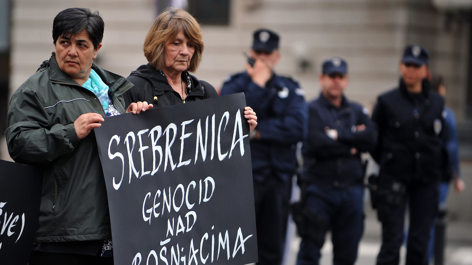 articles/2012/05/30/humanitarian-intervention-again-and-again/serbia-protest-openz_ei2yip