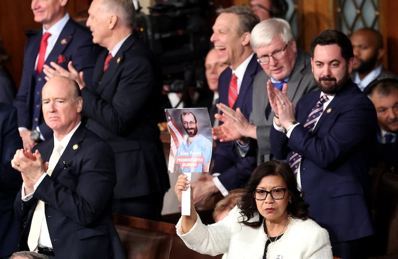 Norma Torres (D- CA) holds up a photo of Minnesota shooting victim Alex Pretti who was killed during an immigration enforcement operation