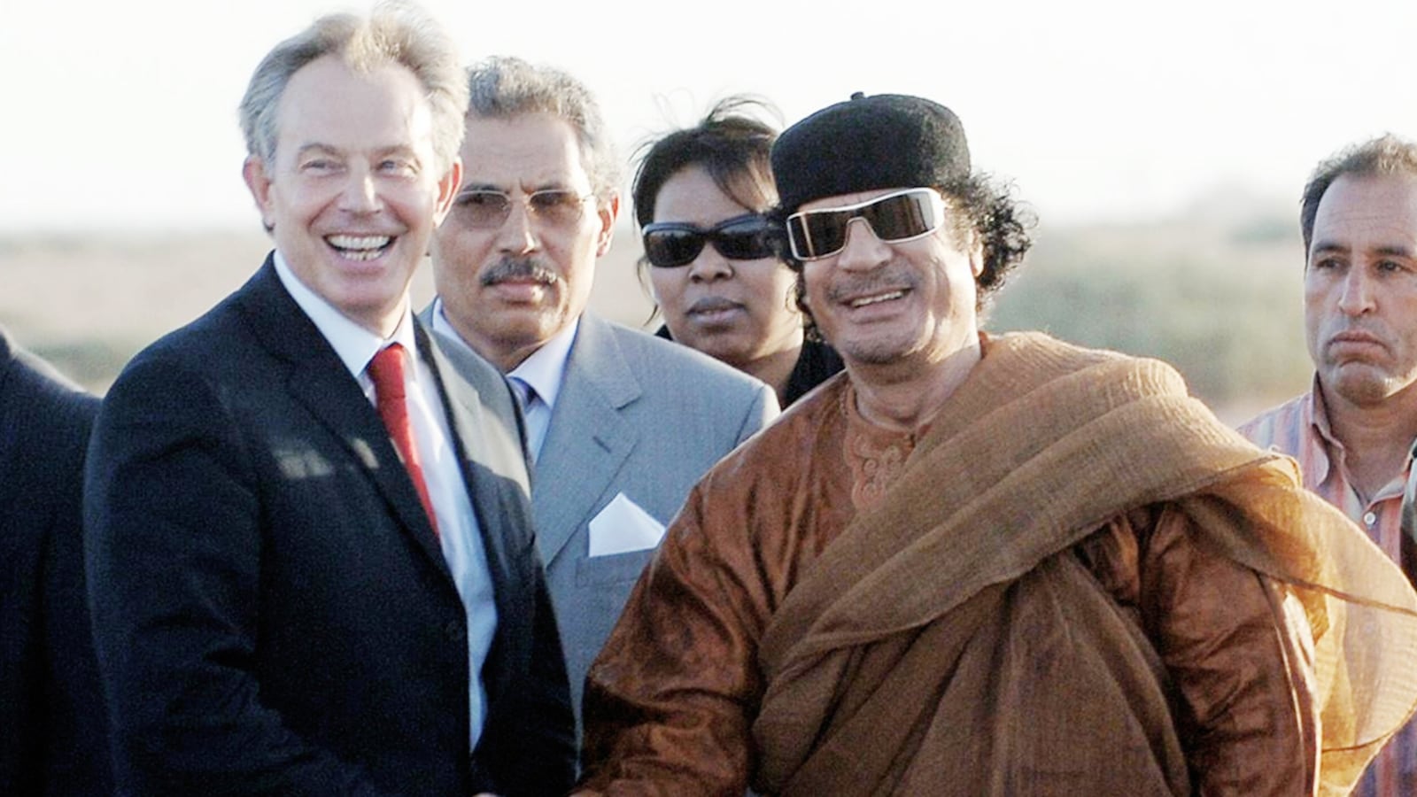 articles/2011/09/25/tony-blair-s-gaddafi-meetings-mideast-work-raise-questions/blair-muammar-gaddafi-blair-wrap_g9l846