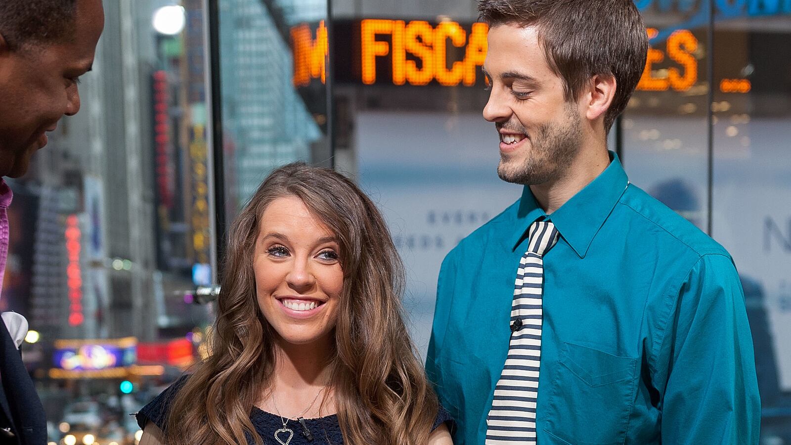 Jill Duggar Dillard (L) and husband Derick Dillard visit \"Extra\" at their New York studios at H&M in Times Square