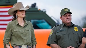 U.S. Secretary of Homeland Security Kristi Noem stands alongside U.S. Border Patrol Rio Grande Valley Sector Chief Jared Ashby, left, and U.S. Border Patrol Chief Mike Banks