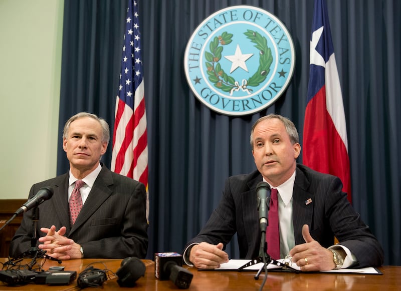 Texas Gov. Greg Abbott and Attorney General Ken Paxton hold a press conference.