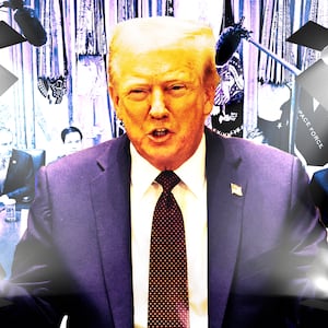 A photo illustration of President Donald Trump lit by studio lights during a cabinet meeting.