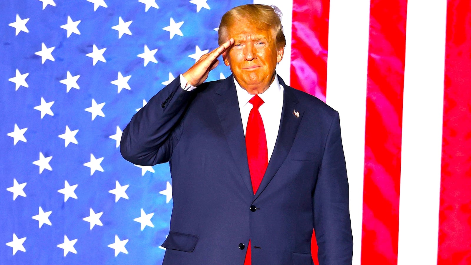 Donald Trump salutes supporters during a campaign rally at Minden-Tahoe Airport on October 08, 2022 in Minden, Nevada.