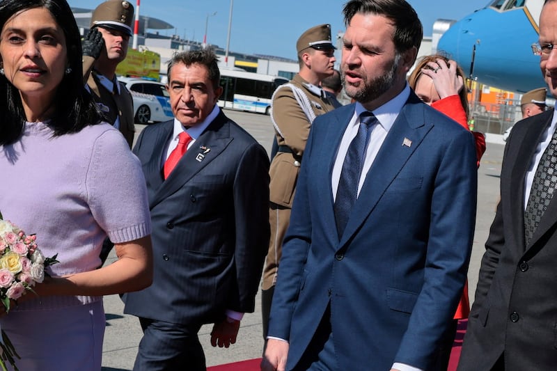 Paolo Zampolli (2nd L), a friend of President Donald Trump and Trump's envoy for global partnerships, joins Hungarian Foreign Minister Peter Szijjarto and other dignitaries on the red carpet to welcome U.S. Vice President JD Vance and second lady Usha Vance as they arrive at Budapest Ferenc Liszt International Airport in Budapest, Hungary, April 7, 2026. REUTERS/Jonathan Ernst/Pool