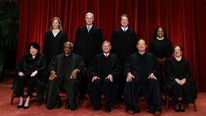 U.S. Supreme Court justices Amy Coney Barrett, Neil Gorsuch, Brett Kavanaugh, Ketanji Brown Jackson, Sonia Sotomayor, Clarence Thomas, Chief Justice John Roberts, Jr., Samuel Alito and Elena Kagan pose for a group portrait in Washington, D.C. on October 7, 2022.