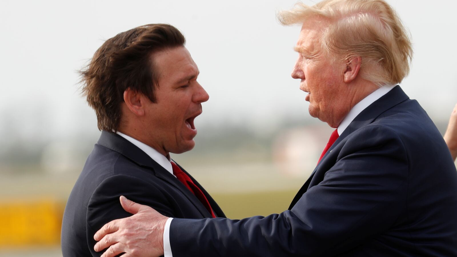 U.S. President Donald Trump greets Florida Governor Ron DeSantis as he arrives at Tyndall Air Force Base near Panama City, Florida, U.S., May 8, 2019.