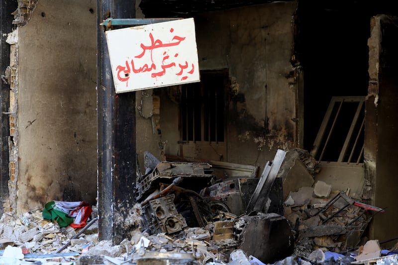 Debris lies at the site of a residential building damaged by a strike on March 4, in Tehran, Iran, April 14, 2026. REUTERS/Thaier Al Sudani
