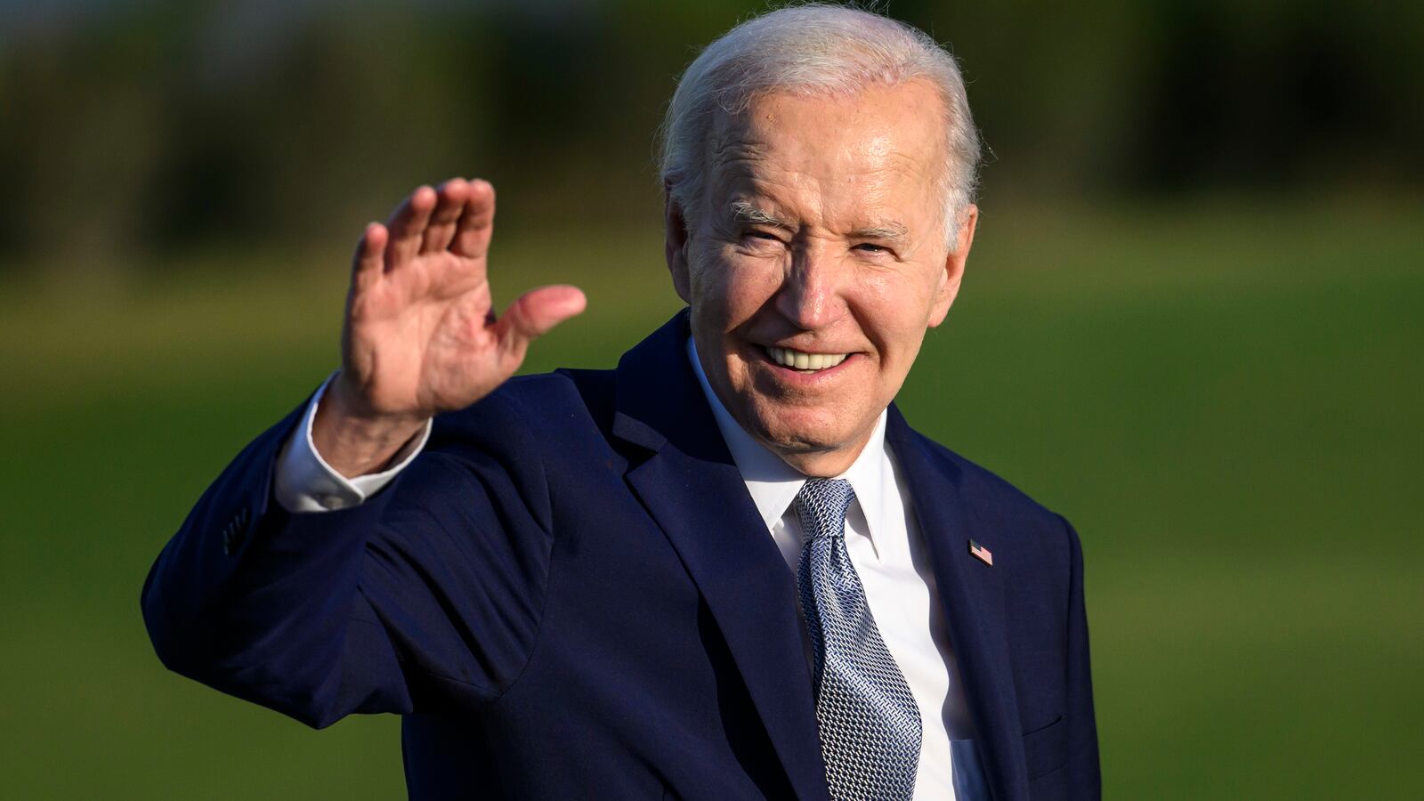 President Joe Biden joins G7 leaders as they gather to watch a parachute drop at San Domenico Golf Club.
