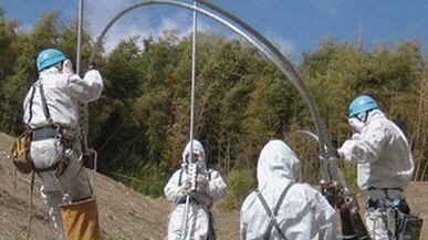 cheats/2011/03/31/japan-pressured-to-expand-evacuations/japan-nuclear-workers_fxyae5