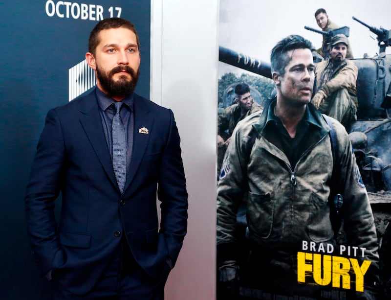 Cast member Shia LaBeouf is pictured on the red carpet at the premiere of the World War II film "Fury" at the Newseum in Washington October 15, 2014.  REUTERS/Jonathan Ernst    (UNITED STATES - Tags: ENTERTAINMENT)