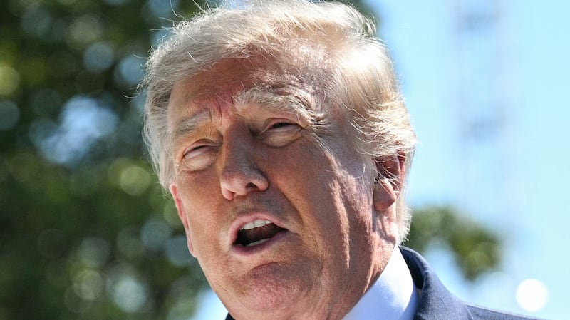 US President Donald Trump speaks to the press about ongoing construction of a helipad and other projects on the South Lawn of the White House in Washington, DC, on August 19, 2026.