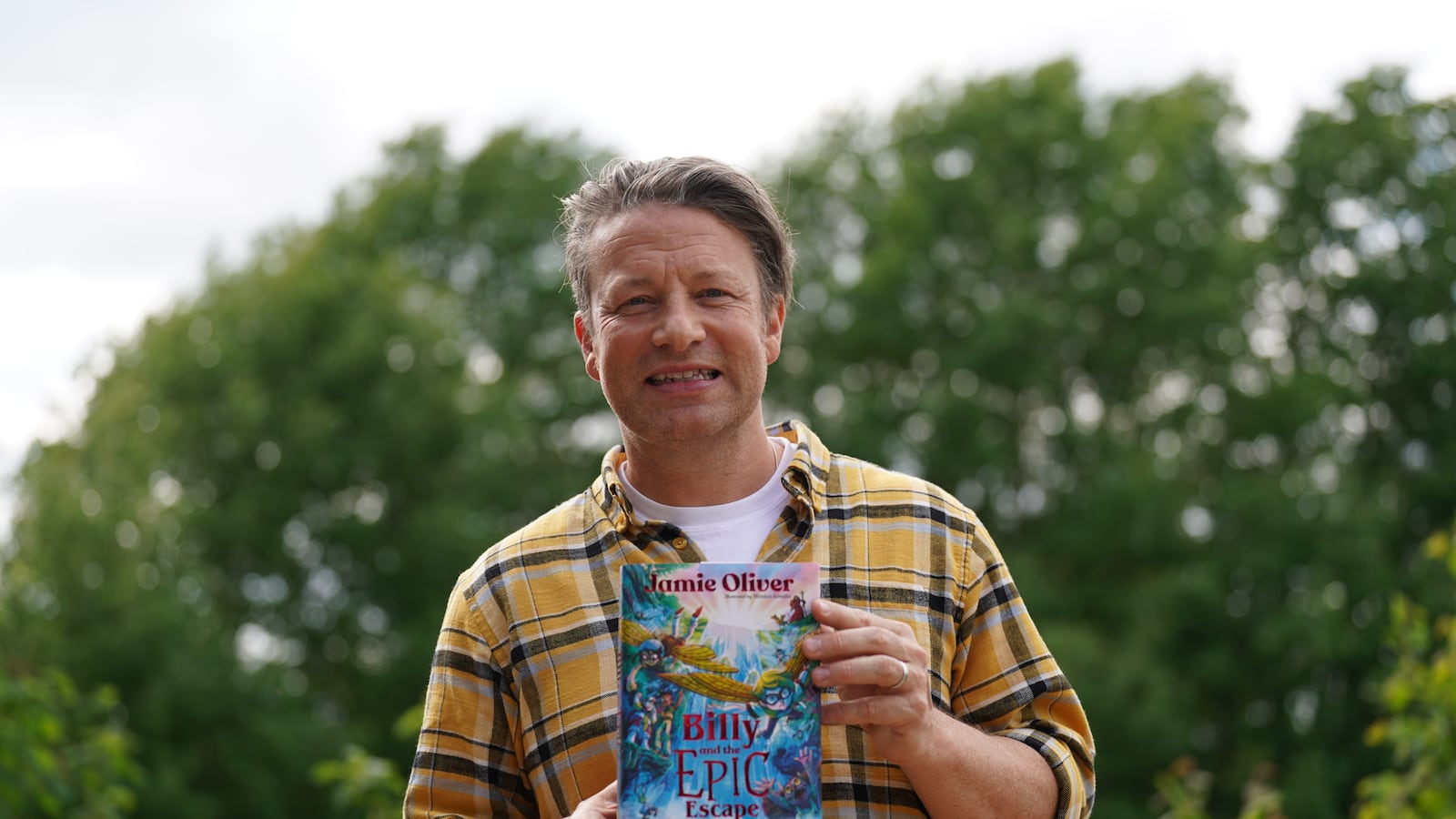 Jamie Oliver during a visit to Great Bradfords Junior School, in Braintree, Essex, as he launches his new book, Billy and the Epic Escape, on May 23, 2024.