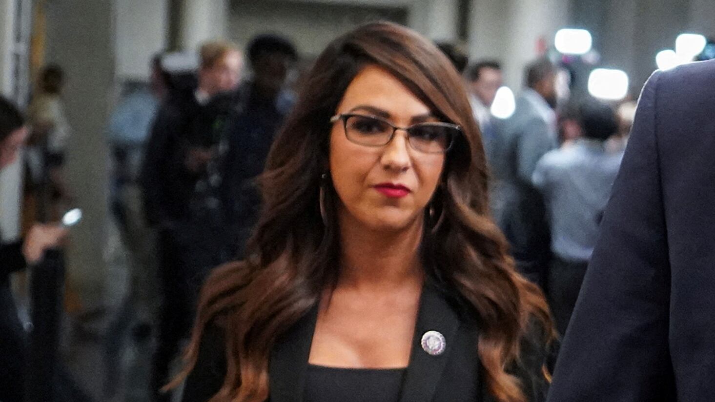 Lauren Boebert walks through a hallway on Capitol Hill.