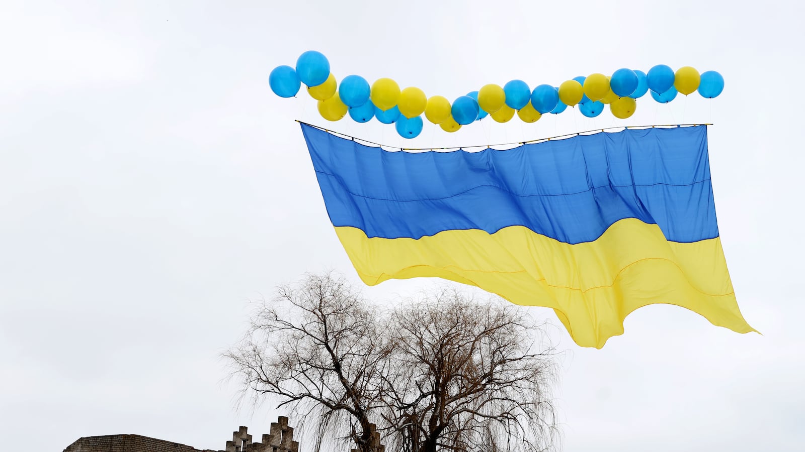 A group of activists in the Donbas region of eastern Ukraine send Ukrainian flag in balloons to separatist-held territories, on February 09, 2022 in Svitlodarsk, Ukraine.