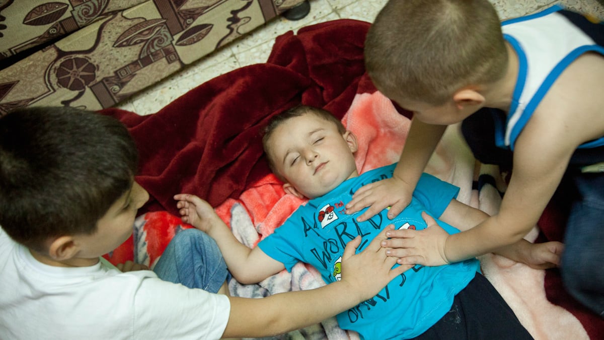 articles/2012/08/23/bashar-al-assad-s-war-on-syria-s-children/syria-kids-giglo_xwgd6k